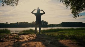 father and son in park. father day silhouette happy family child dream concept. father carries his son on his back. family dad playing with his son in fun nature in the park silhouette - Powered by Shutterstock - Get 15% off with code: PIKWIZARD15