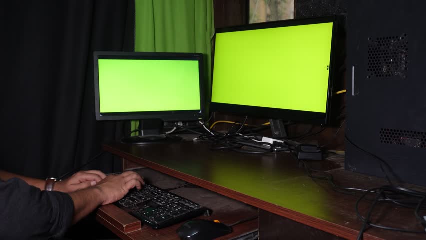 Computer dual screen, easy masking, green screen, man, businessman working on computer, video editing, designing, technology work 