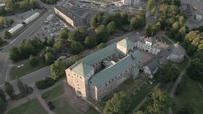 Scenic aerial footage of Turku Castle at sunset