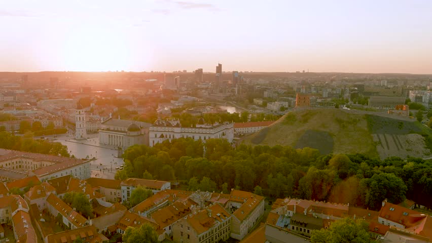 Aerial view of Vilnius Old Town, one of the largest surviving medieval old towns in Northern Europe. Summer landscape of UNESCO-inscribed Old Town of Vilnius, Lithuania Royalty-Free Stock Footage #1106402473