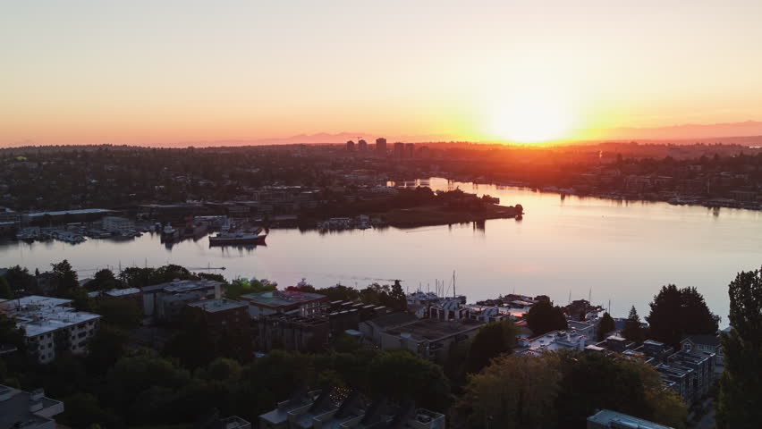 Establishing Aerial View Shot of Seattle WA, Washington US, sun rises in the green city, Lake Union, Fremont, Wallingford, Queen Anne