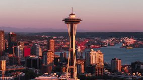 Super Shot, Establishing Aerial View Shot of Seattle WA, Washington US, Yellow and Red, incredible light, Space Needle and Downtown Seattle Skyline, Mount Rainier, circling right part 1