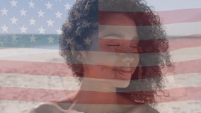 Animation of biracial man by sea over flag of usa. American patriotism, diversity and independence concept digitally generated video. - Powered by Shutterstock - Get 15% off with code: PIKWIZARD15