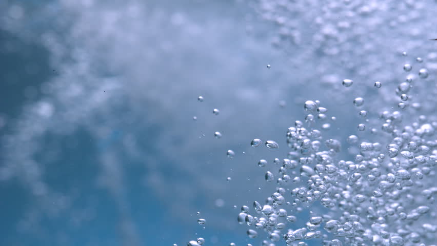 High speed shooting of natural clear mineral water bubbles