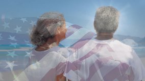 Animation of happy caucasian couple by sea over flag of usa. American patriotism, diversity and independence concept digitally generated video. - Powered by Shutterstock - Get 15% off with code: PIKWIZARD15