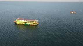 Ariel orbit of large traditional Thai passenger boat