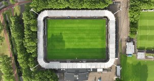 Aerial drone video of a top down video on a small football stadium in Waalwijk, the Netherlands