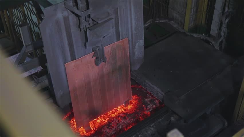 The furnace with molten metal, the melting of copper in the furnace, the process of melting copper in the furnace Royalty-Free Stock Footage #1106427303