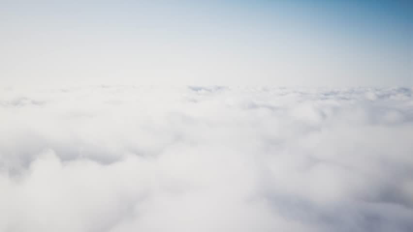 F-16 Fighting Falcon. Jet fighter flying above the clouds