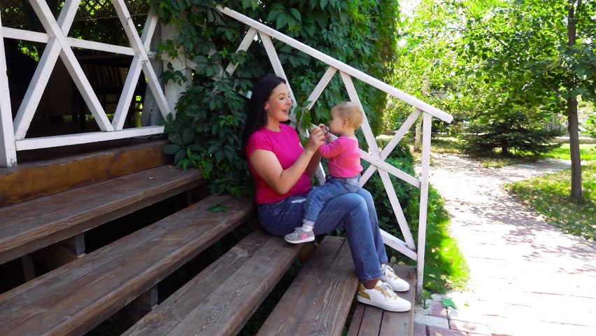 girl and daughter playing on the stairs