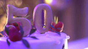 Anniversary numbers 50 on a cake - Powered by Shutterstock - Get 15% off with code: PIKWIZARD15