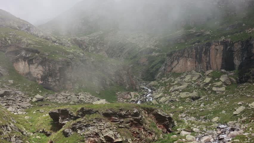 
Timelapse, rapid passage of clouds and mist at the Gran Piano di Noasca. Graian Alps, high altitude