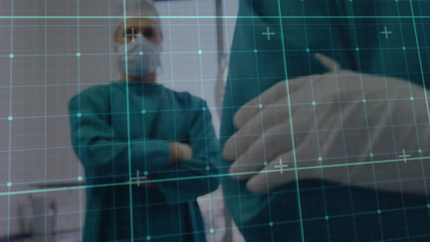 Animation of data processing over caucasian male surgeon in hospital. Global medicine, healthcare, computing and data processing concept digitally generated video.