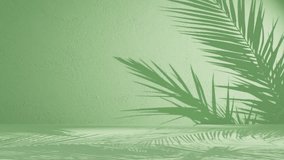 a palm leaves shadow on green background wall with copy space. vertical - Powered by Shutterstock - Get 15% off with code: PIKWIZARD15