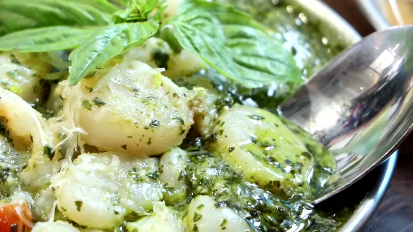 Scallops in Pesto Sauce seafood Close up