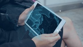 Animation of data on screens over caucasian businessman with tablet. Global networks, business, finances, computing and data processing concept digitally generated video. - Powered by Shutterstock - Get 15% off with code: PIKWIZARD15