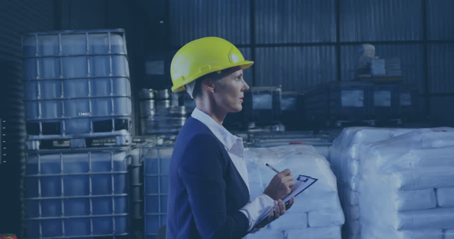 Animation of data processing on screens over caucasian woman working in warehouse. Global shipping, networks, digital interface, computing and data processing concept digitally generated video.
