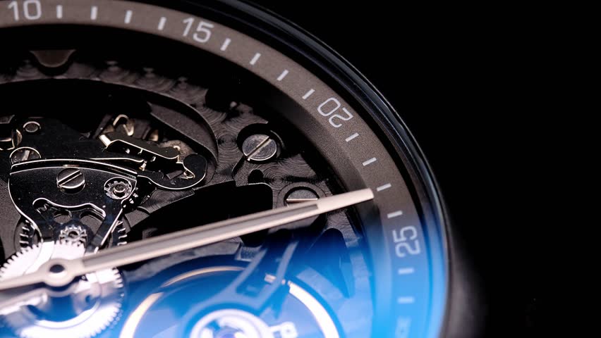 gear drive motion in skeleton watch. Mechanical watches with gears and cogs. Watch or clock mechanism. Clockwork details and parts. Inside watch, mechanical watch in macro view. Macro Shot Clock Face Royalty-Free Stock Footage #1106497409