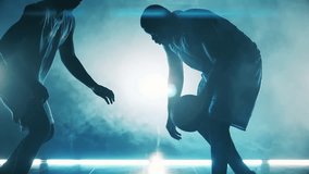 Dark room with smoke and two sportsmen training with basketball - Powered by Shutterstock - Get 15% off with code: PIKWIZARD15