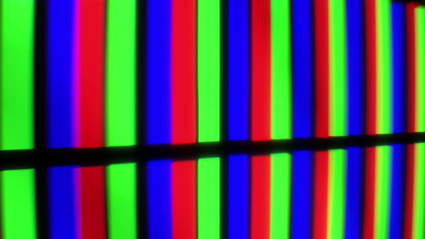 Macro close-up on LCD screen, single RGB lights form a complete picture when camera zooms out.