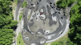 4k video of Merapi Lava Tour Offroad Adventure, Very famous and exciting recreation for tourists by riding in an open car along cobbled streets and rivers located in Sleman, Yogyakarta, Indonesia.