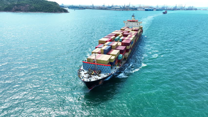 aerial front view Cargo Ship carrying container and running for export goods from cargo yard port to other ocean concept freight shipping ship