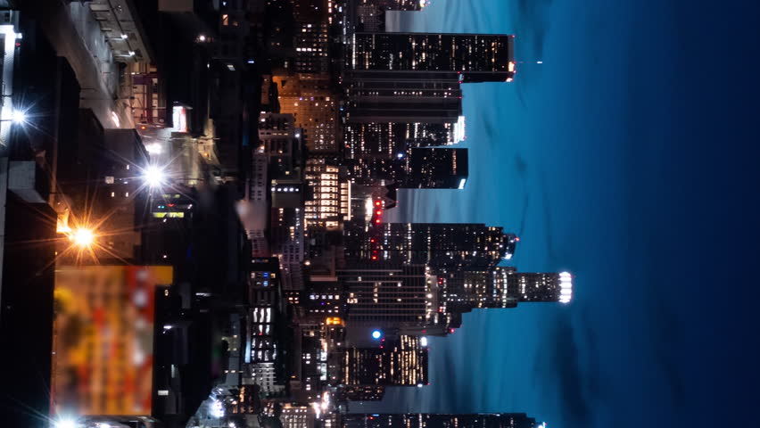 Night illuminated flight over Los Angeles city downtown traffic aerial topdown panorama 4k timelapse. 
Los Angeles night evening hyperlapse timelapse buildings skyline downtown. Vertical video. 