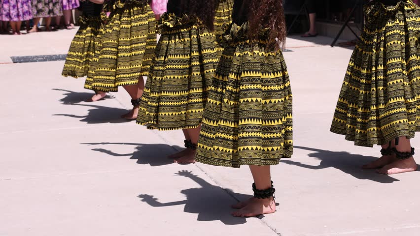 Synchronized hula dance steps lifts and dips