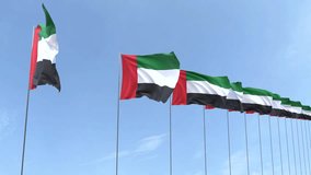 Looping video of United Arab Emirates flag Waving on blue sky background, Animation United Arab Emirates flag