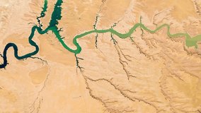 Satellite view of Lake Powell. A view from space of a lake in a drought. Elements of this video furnished by NASA.