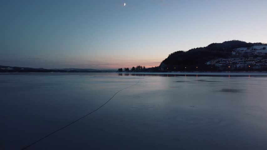 Beautiful sunset at frozen lake