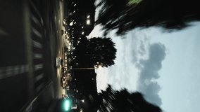 Vertical video - Time lapse clip, moving forward at night city road. Hyperlapse of city streets at nighttime