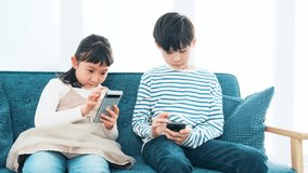 girl and boy looking at smartphone.