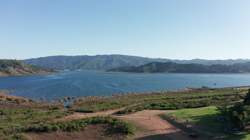 Wide rising aerial shot of Lake Casitas in California. 4K