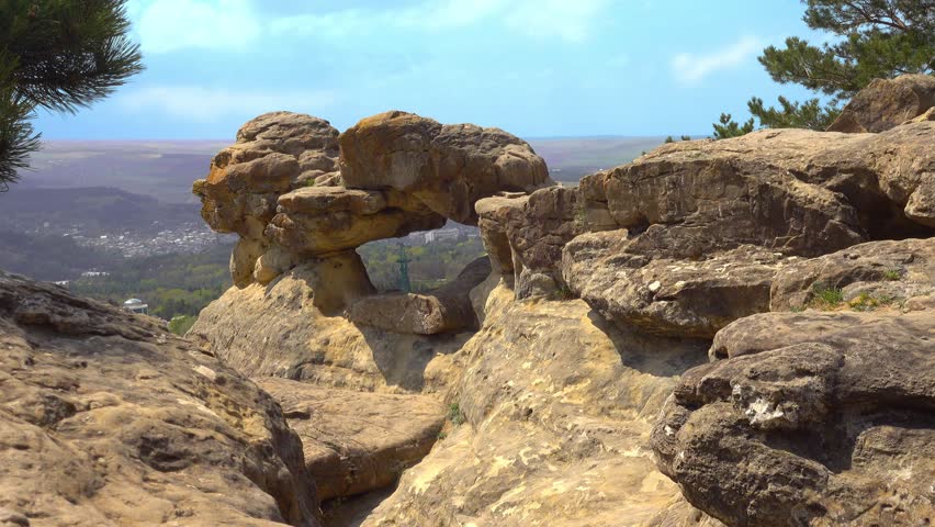 Rocky mountain with grottos and views of the city from the cliff Blue stones in Kislovodsk Park, North Caucasus 