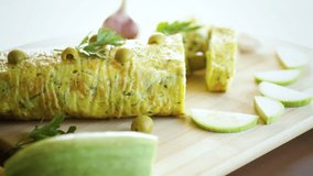 vegetable zucchini roll with garlic cheese filling inside.