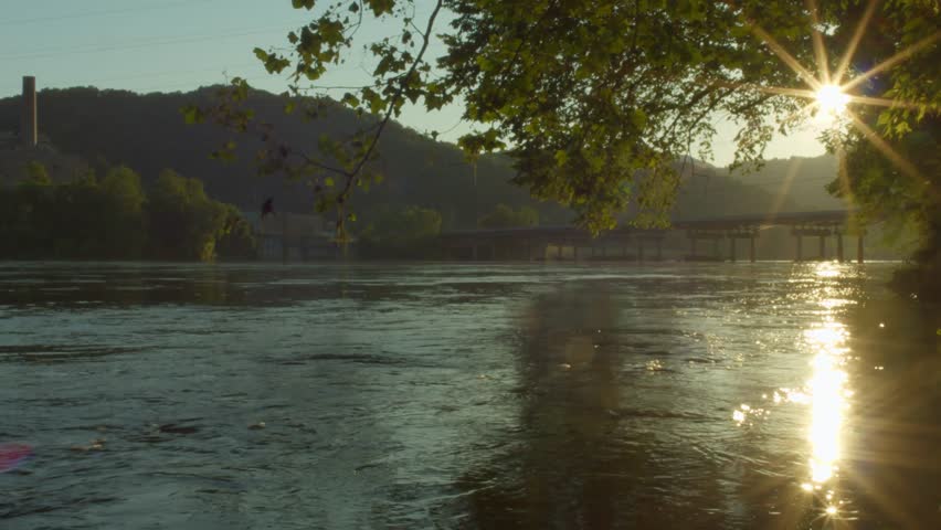 Sunset on the new river bank of New River in Glen Lyn Virginia