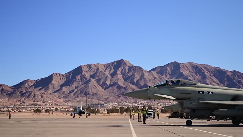 Circa 2023 - royal air force eurofighter typhoon and australian air force fa 18f super hornet fighter jets nellis air force base, nv