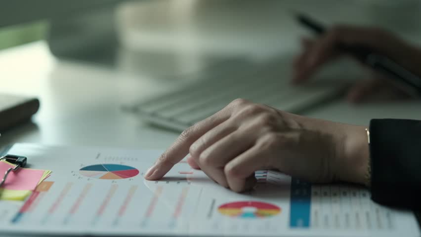 Closeup shot of statistician analyzing sales statistics performed at office workplace Royalty-Free Stock Footage #1106622777