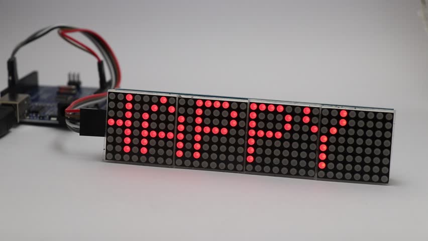 LED matrix display of 8x64 size scrolling message screen with a happy birthday message. Programmable micro controller with custom Text display - Powered by Shutterstock - Get 15% off with code: PIKWIZARD15