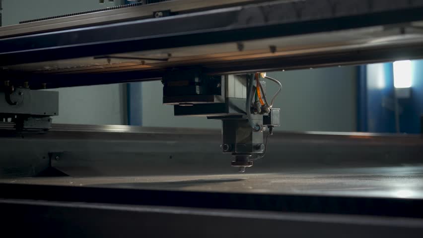 Industrial CNC laser cutting machine cuts metal sheet Royalty-Free Stock Footage #1106623295
