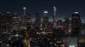 Establishing Aerial View Shot of Los Angeles at night evening LA CA, L.A. California US, circling close, perfect clear image, Downtown LA, DTLA