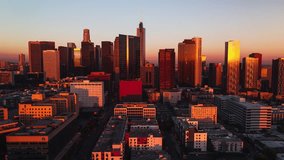 Establishing Aerial View Shot of Los Angeles LA CA, L.A. California US, Downtown LA, DTLA, LA Skyline, magical red light, stunning, track in push in, part 2