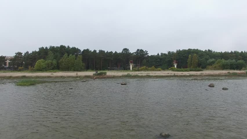 Old Soviet symbols. Camera is moving from the sea. Aerial view.