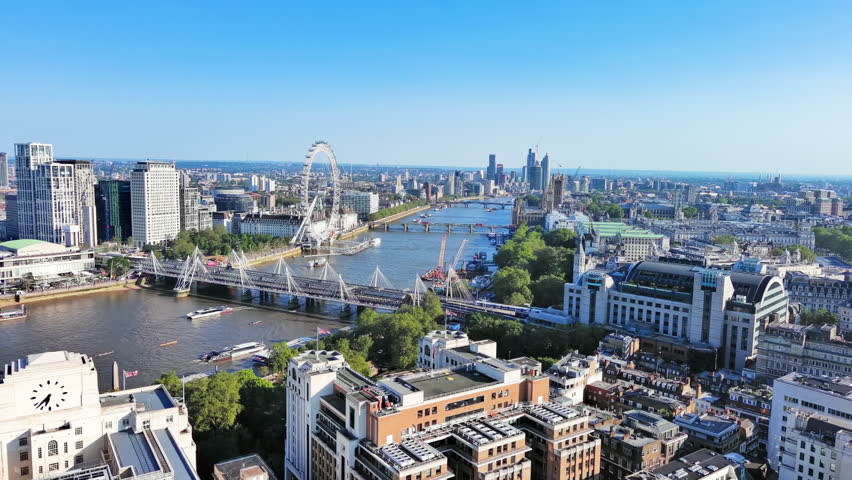 Aerial View of London, UK: Iconic Ferris Wheel the London Eye in Center of Capital City of Great Britain and Northern Ireland Royalty-Free Stock Footage #1106629697