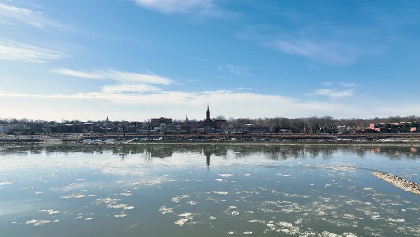 Drone over the Missouri River looking into a small town Washington, Missouri