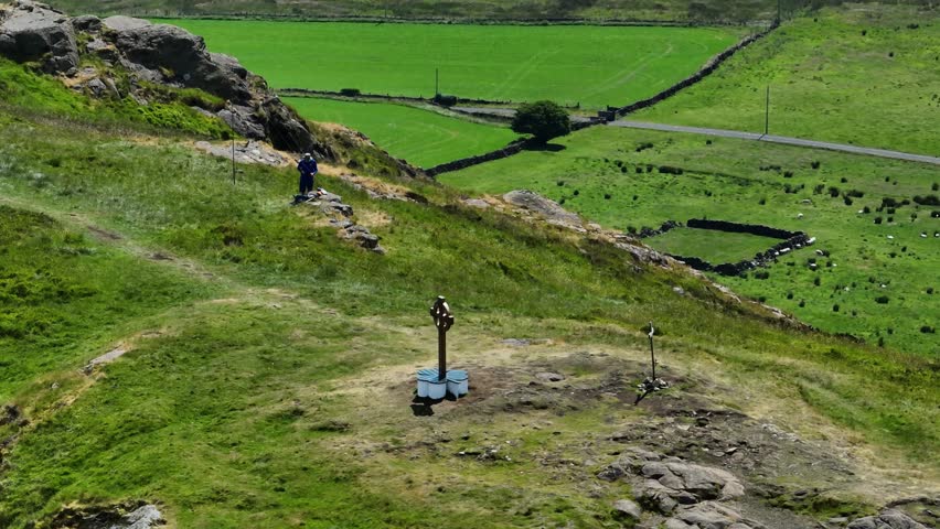 Aerial view of a Celtic Cross on the top of Slemish Mountain County Antrim Northern Ireland Slemish hill where St Patrick worked as a boy