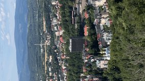 Panoramic view of Karlovy Vary from Diana lookout tower, Czech Republic. Vertical video