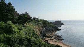 Experience the allure of Belle-Île, Bretagne with 4K drone footage. Glide over rugged cliffs, turquoise waters, and charming coastal hamlets. Ideal for projects of nature's beauty, travel, or coastal.
