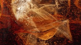 Bubbles and Ice Cubes in a Glass of Cola or Lemonade - Powered by Shutterstock - Get 15% off with code: PIKWIZARD15